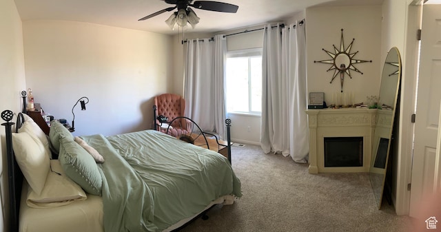 1013 N 740 W, Centerville, UT 84014 - carpeted bedroom featuring baseboards, ceiling fan, and a fireplace