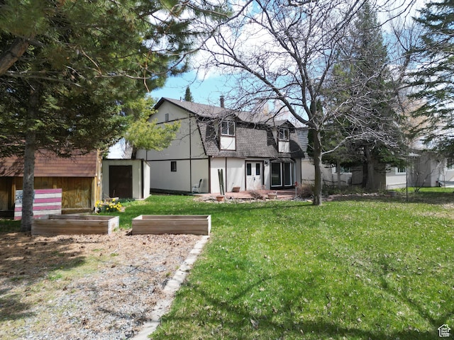 2160 N 730th St W, Garden City, UT 84028 - view of front of property featuring roof with shingles and a front yard