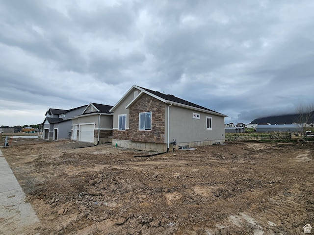 496 N 500 E Lot 5, Salem, UT 84653 - view of property exterior featuring stone siding and an attached garage