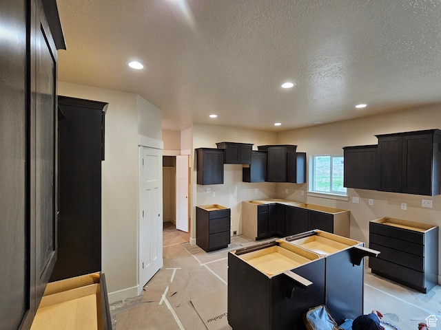 496 N 500 E Lot 5, Salem, UT 84653 - kitchen with recessed lighting, a textured ceiling, dark cabinets, and baseboards