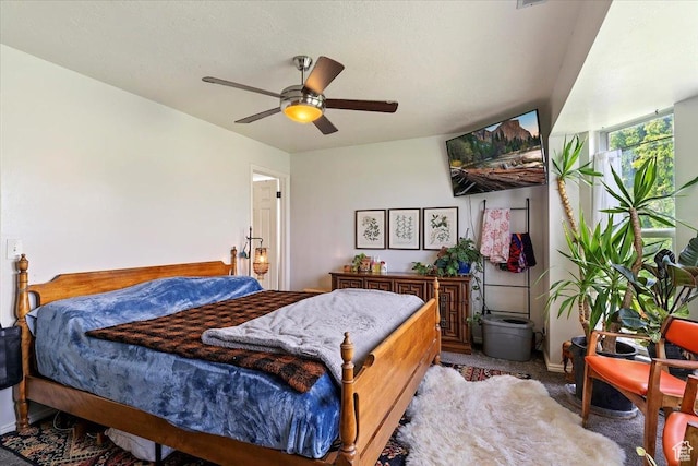 bedroom with carpet flooring and ceiling fan