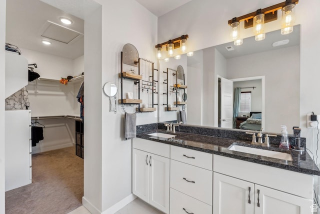 11619 S Silver Pond Dr W, South Jordan, UT 84009 - full bathroom featuring double vanity, a walk in closet, a sink, and ensuite bathroom