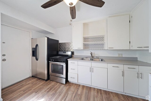 5390 S 4460 W, Kearns, UT 84118 - kitchen with open shelves, a sink, white cabinetry, a ceiling fan, and appliances with stainless steel finishes