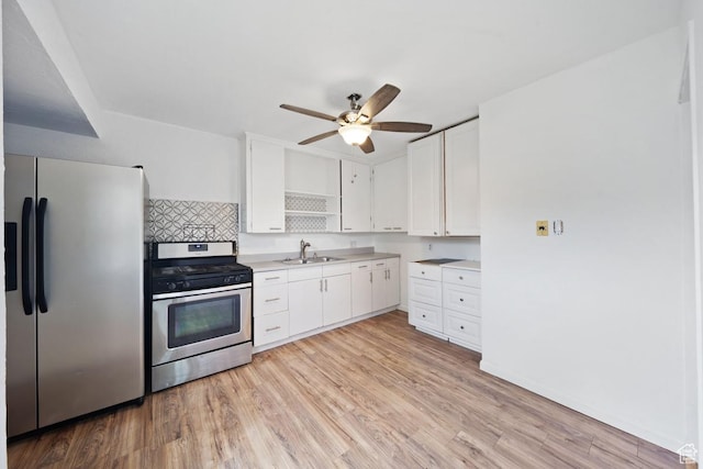 5390 S 4460 W, Kearns, UT 84118 - kitchen featuring light countertops, appliances with stainless steel finishes, a sink, and light wood finished floors
