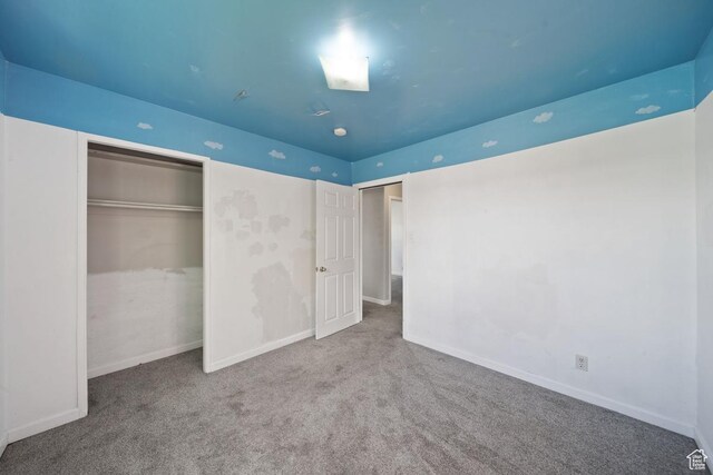 5390 S 4460 W, Kearns, UT 84118 - unfurnished bedroom with baseboards, carpet, and a closet