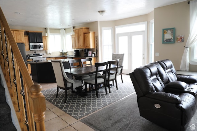 7044 W 8050 S, West Jordan, UT 84081 - dining space with stairway and light tile patterned flooring