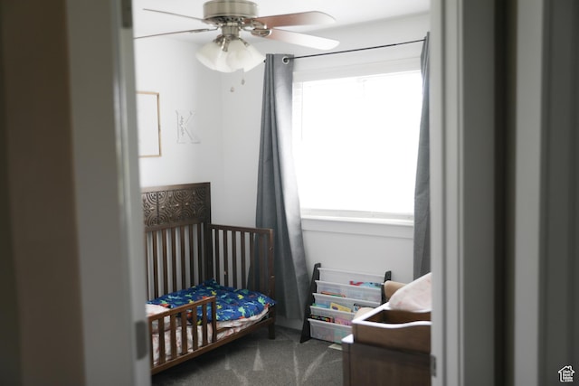 7044 W 8050 S, West Jordan, UT 84081 - bedroom with a crib, a ceiling fan, and carpet flooring