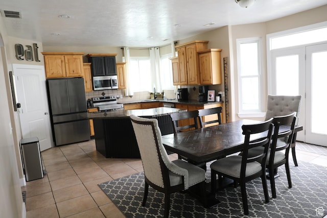 7044 W 8050 S, West Jordan, UT 84081 - dining room featuring visible vents and light tile patterned floors