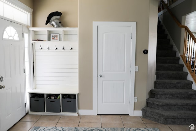 7044 W 8050 S, West Jordan, UT 84081 - mudroom featuring light tile patterned floors and baseboards
