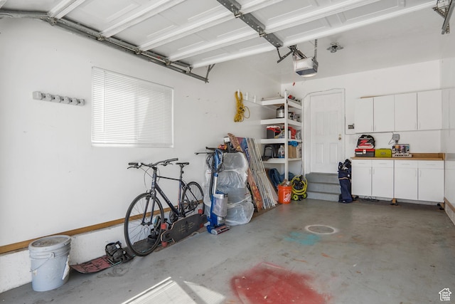 6888 S Hillside Village Cir, Salt Lake City, UT 84121 - garage featuring a garage door opener