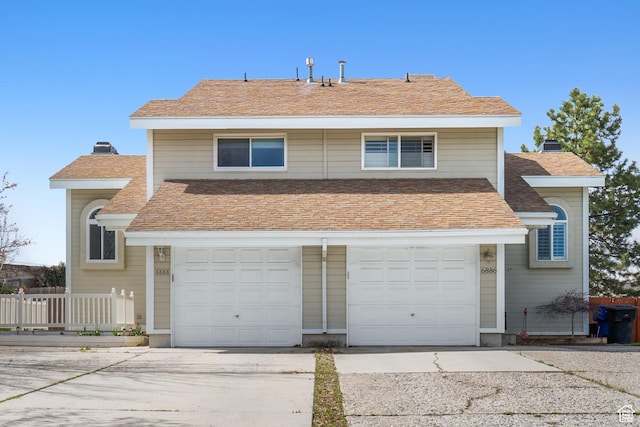6888 S Hillside Village Cir, Salt Lake City, UT 84121 - traditional-style home with fence, driveway, a chimney, and a garage