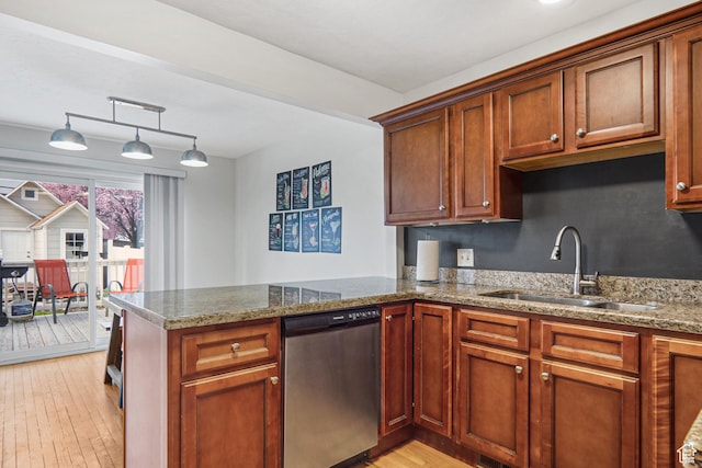 6888 S Hillside Village Cir, Salt Lake City, UT 84121 - kitchen featuring dishwasher, a sink, light stone counters, a peninsula, and light wood finished floors