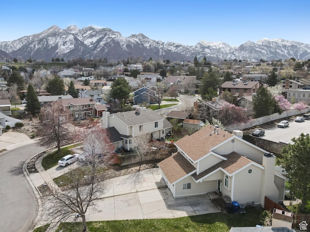 6888 S Hillside Village Cir, Salt Lake City, UT 84121 - birds eye view of property with a residential view and a mountain view