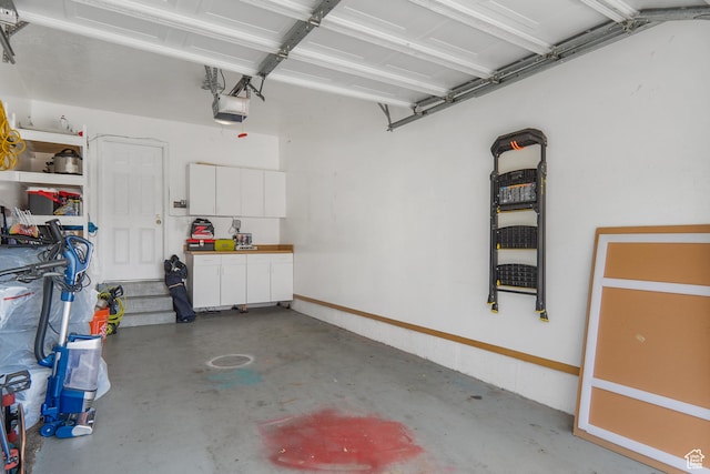 6888 S Hillside Village Cir, Salt Lake City, UT 84121 - garage featuring a garage door opener