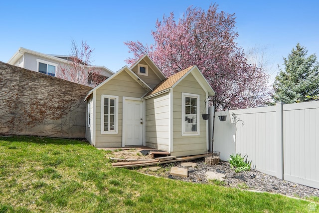 6888 S Hillside Village Cir, Salt Lake City, UT 84121 - view of outdoor structure featuring fence and an outdoor structure