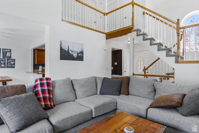 6888 S Hillside Village Cir, Salt Lake City, UT 84121 - living room with stairs and a high ceiling