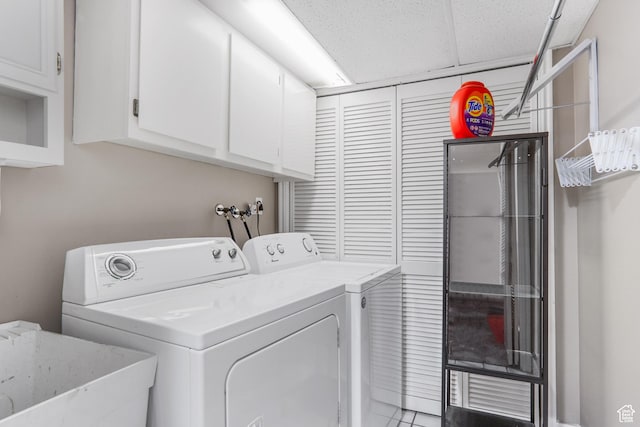 6888 S Hillside Village Cir, Salt Lake City, UT 84121 - laundry room with cabinet space, independent washer and dryer, tile patterned floors, and a sink