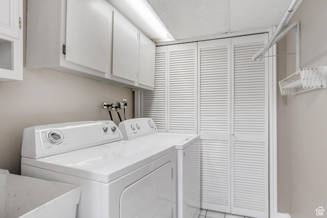 6888 S Hillside Village Cir, Salt Lake City, UT 84121 - laundry room featuring a sink, cabinet space, and washing machine and dryer