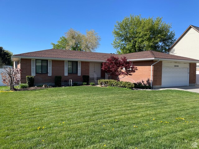 1846 E 9800 S, Sandy, UT 84092 - ranch-style home with an attached garage, a front lawn, and brick siding
