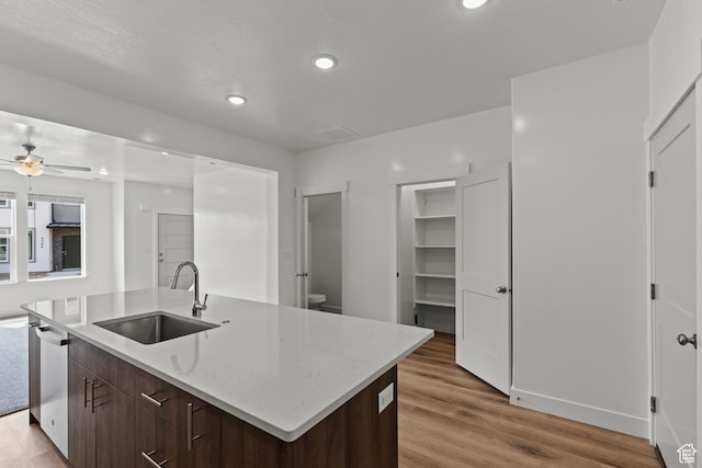 3372 S 1010 W, Nibley, UT 84321 - kitchen featuring a ceiling fan, a sink, light wood-style flooring, and dishwasher