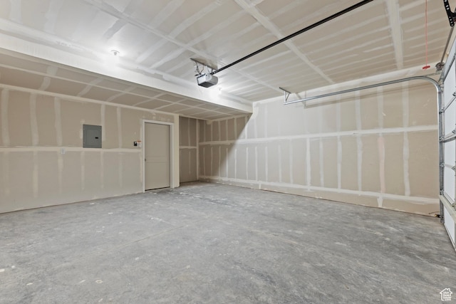 3372 S 1010 W, Nibley, UT 84321 - garage featuring a garage door opener and electric panel