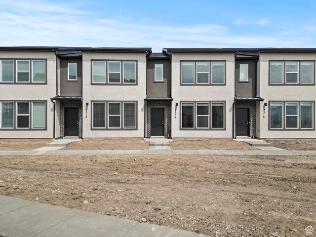 3372 S 1010 W, Nibley, UT 84321 - townhome / multi-family property with stucco siding
