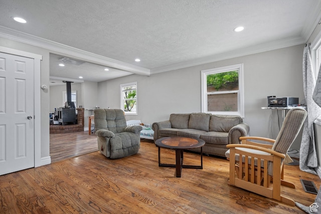 4207 W 5655 S, Salt Lake City, UT 84118 - living area with recessed lighting, a wood stove, and wood finished floors