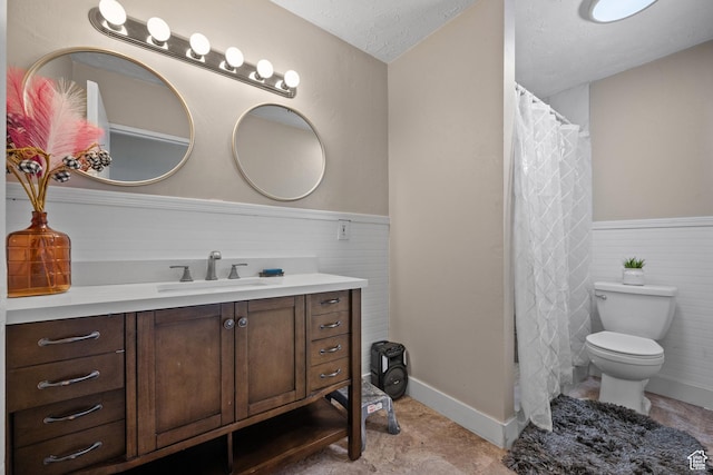 4207 W 5655 S, Salt Lake City, UT 84118 - full bath with wainscoting, vanity, toilet, a textured ceiling, and curtained shower