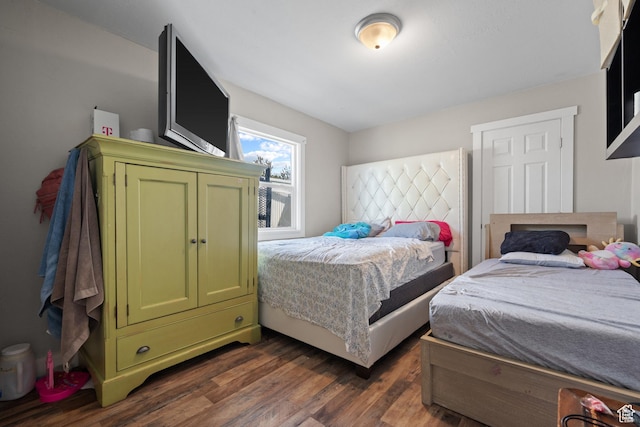 4207 W 5655 S, Salt Lake City, UT 84118 - bedroom featuring dark wood-style flooring