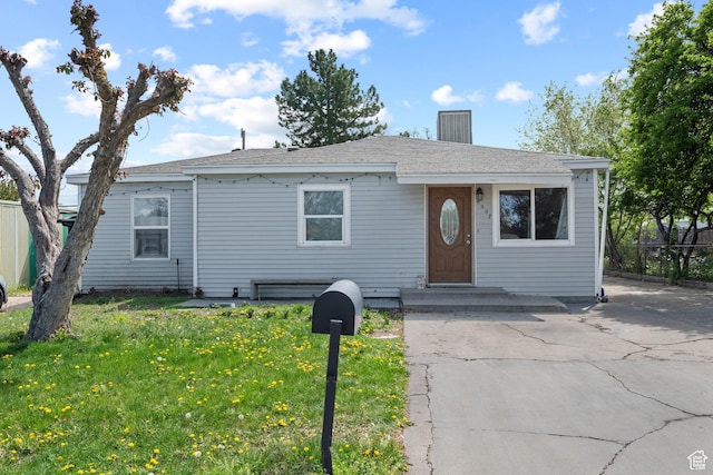 4207 W 5655 S, Salt Lake City, UT 84118 - bungalow-style home with a chimney, fence, and a front yard