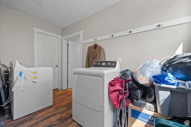 4207 W 5655 S, Salt Lake City, UT 84118 - laundry area with laundry area, a textured ceiling, wood finished floors, and washer and dryer