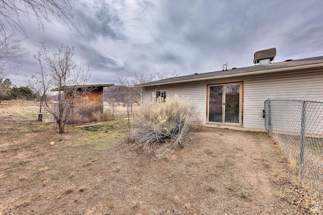 3971 S Spanish Valley Dr, Moab, UT 84532 - rear view of property with fence