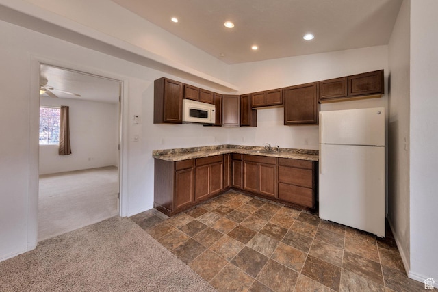 3971 S Spanish Valley Dr, Moab, UT 84532 - kitchen featuring ceiling fan, a sink, light countertops, recessed lighting, and white appliances