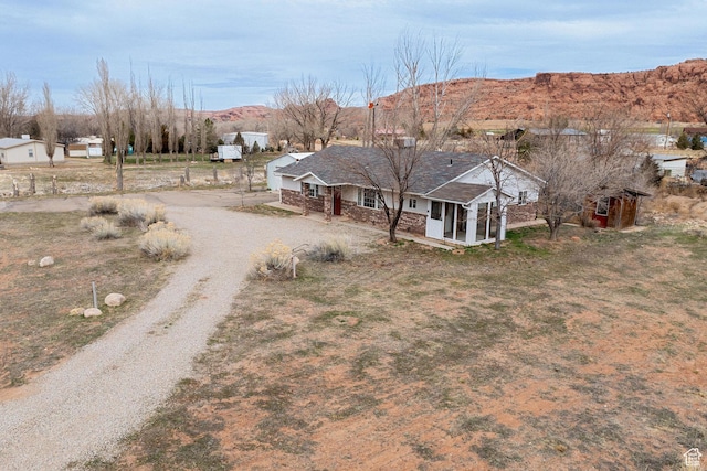 3971 S Spanish Valley Dr, Moab, UT 84532 - birds eye view of property featuring a mountain view