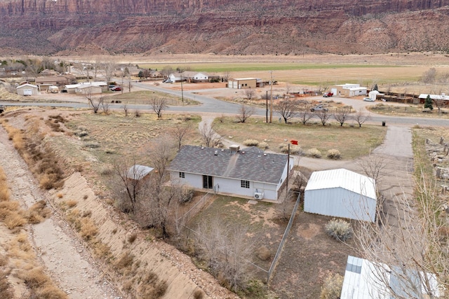 3971 S Spanish Valley Dr, Moab, UT 84532 - drone / aerial view featuring a rural view