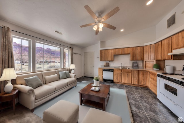 3971 S Spanish Valley Dr, Moab, UT 84532 - living area with recessed lighting, ceiling fan, vaulted ceiling, and visible vents
