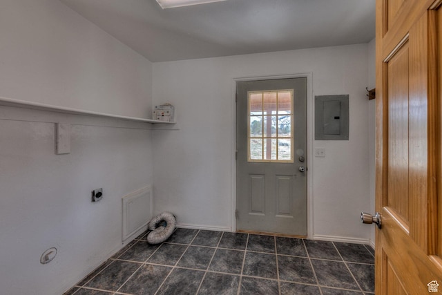 3971 S Spanish Valley Dr, Moab, UT 84532 - laundry area featuring dark tile patterned floors, laundry area, electric panel, electric dryer hookup, and baseboards