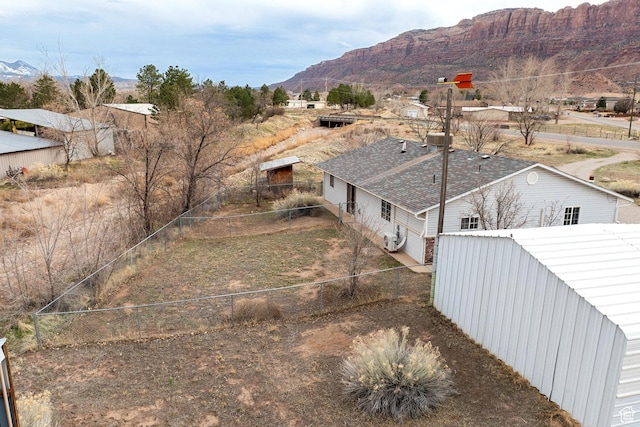 3971 S Spanish Valley Dr, Moab, UT 84532 - drone / aerial view featuring a mountain view