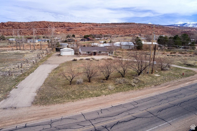 3971 S Spanish Valley Dr, Moab, UT 84532 - drone / aerial view with a mountain view