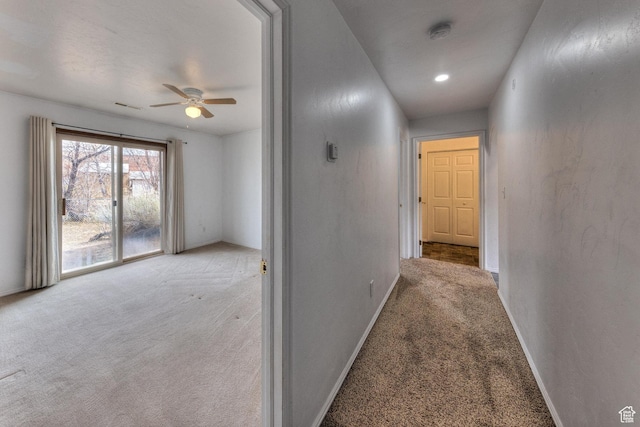 3971 S Spanish Valley Dr, Moab, UT 84532 - corridor with carpet flooring, baseboards, and visible vents