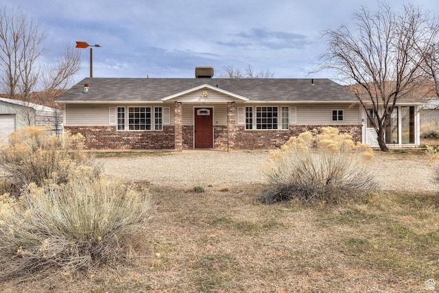 3971 S Spanish Valley Dr, Moab, UT 84532 - single story home featuring brick siding
