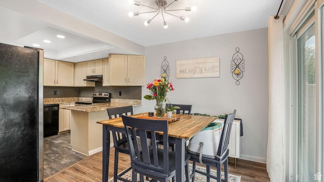 875 E 1150 S Unit 21, Ogden, UT 84404 - dining room with wood finished floors, baseboards, recessed lighting, a raised ceiling, and a chandelier