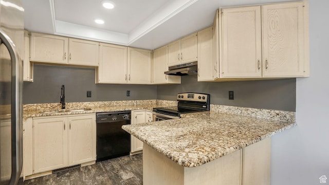 875 E 1150 S Unit 21, Ogden, UT 84404 - kitchen featuring a sink, a peninsula, cream cabinetry, and stainless steel appliances