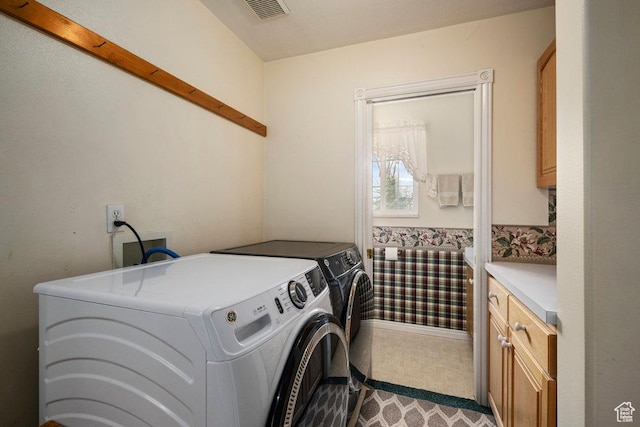4851 E Lake Creek Rd, Heber City, UT 84032 - laundry area featuring visible vents, cabinet space, and washing machine and clothes dryer