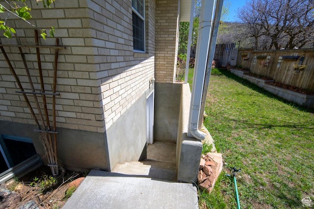 4851 E Lake Creek Rd, Heber City, UT 84032 - view of home's exterior with brick siding and fence