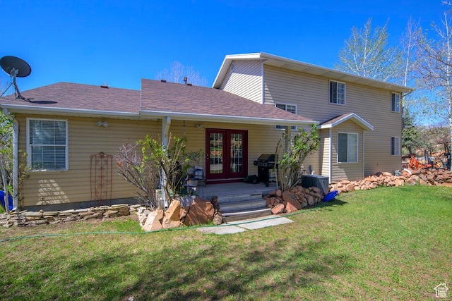 4851 E Lake Creek Rd, Heber City, UT 84032 - view of front of home featuring french doors, central air condition unit, and a front yard