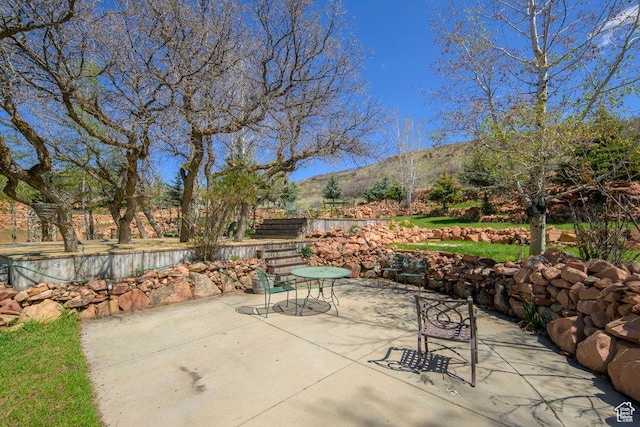 4851 E Lake Creek Rd, Heber City, UT 84032 - view of patio / terrace with a mountain view