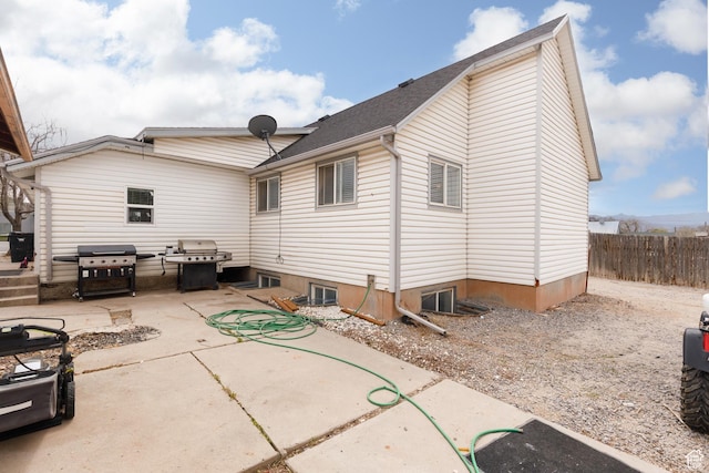 463 E Main St, Salina, UT 84654 - rear view of property with fence, a shingled roof, and a patio area