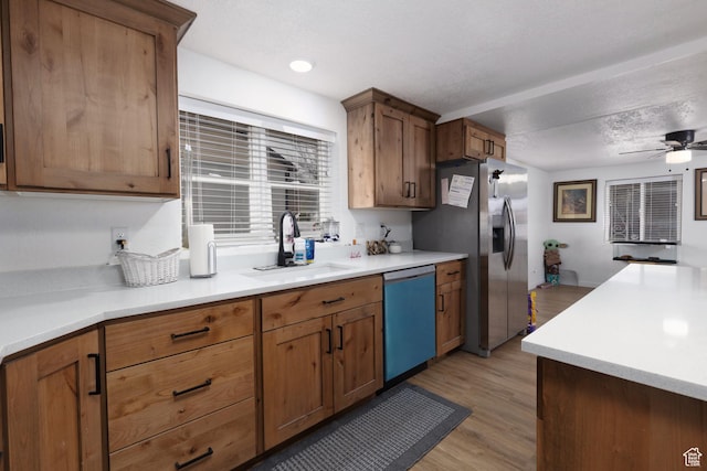 463 E Main St, Salina, UT 84654 - kitchen featuring light countertops, ceiling fan, stainless steel refrigerator with ice dispenser, and dishwasher