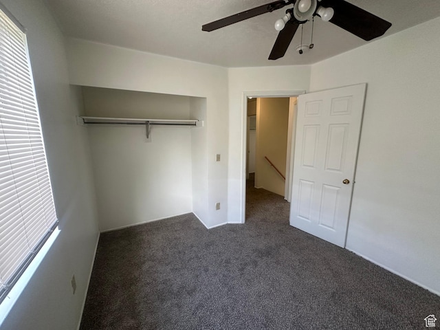 558 N Redwood Rd Unit 2-4, Salt Lake City, UT 84116 - unfurnished bedroom with carpet floors and ceiling fan
